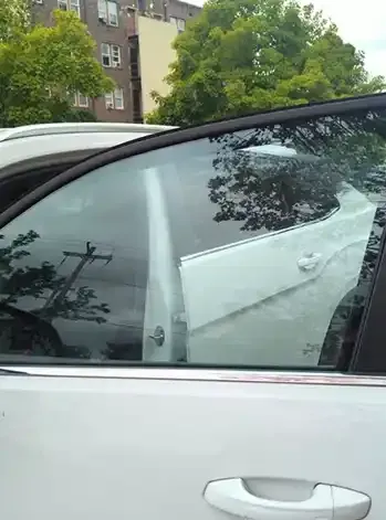 White car with fix side window