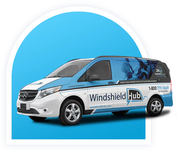 A white and blue van is shown against a blue background. The van features the Windshield Hub logo, contact number (1 800 711 1669), and the website windshieldhub.com. The van also has graphics of a technician
