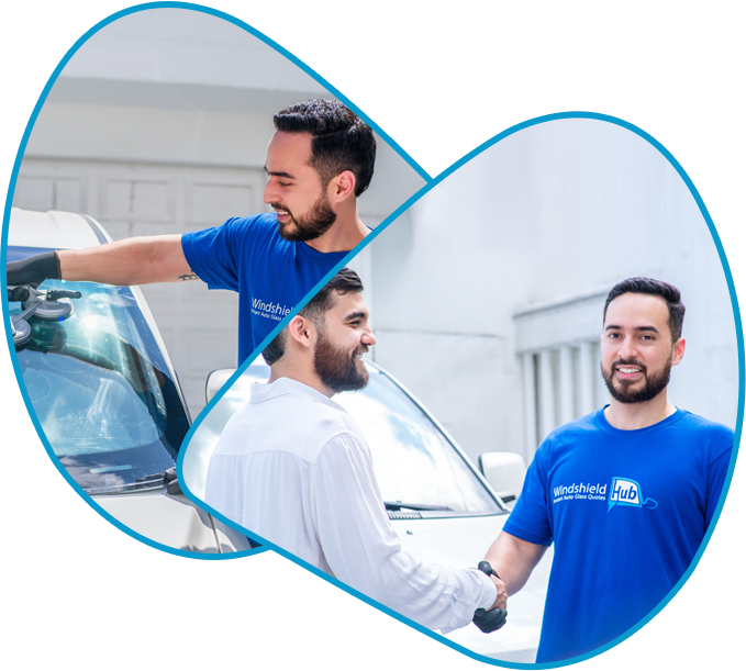 WindshieldHUB technician installing windshield and shaking hands with satisfied customer after service
